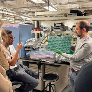 Dan Dwyer shows students Berkeley Lab’s LArPix detector readout system