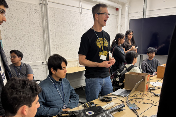 High School Teacher Sean Fottrell and Students working on Cosmic Ray Detectors Credit: Tony Spadafora, Berkeley Lab